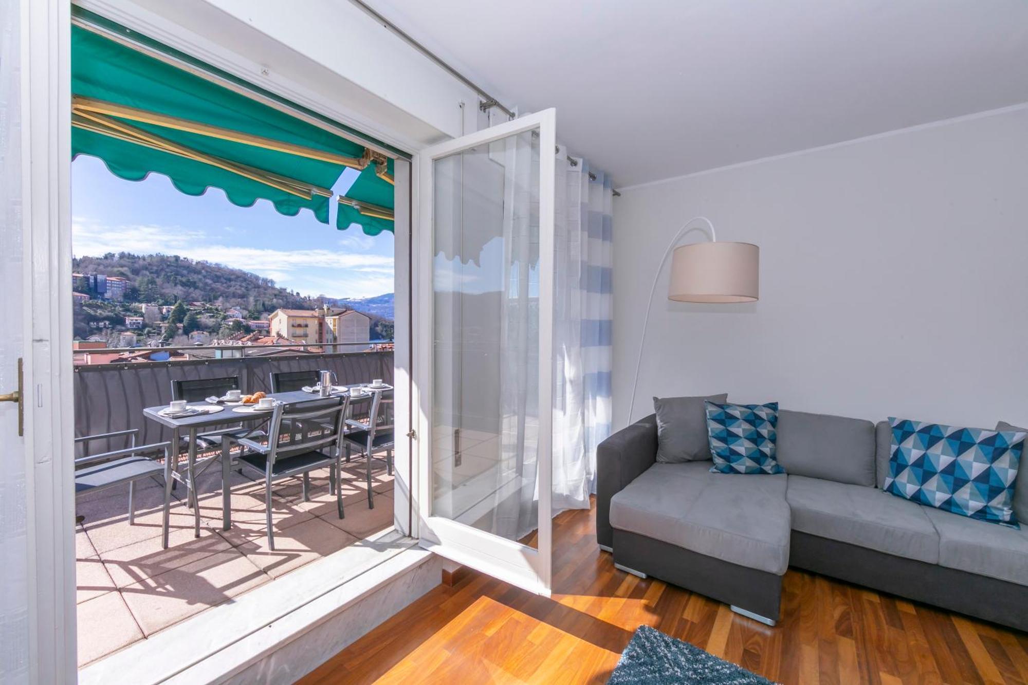 Appartamento Il Golfo Lake View - Happy Rentals Laveno Bagian luar foto